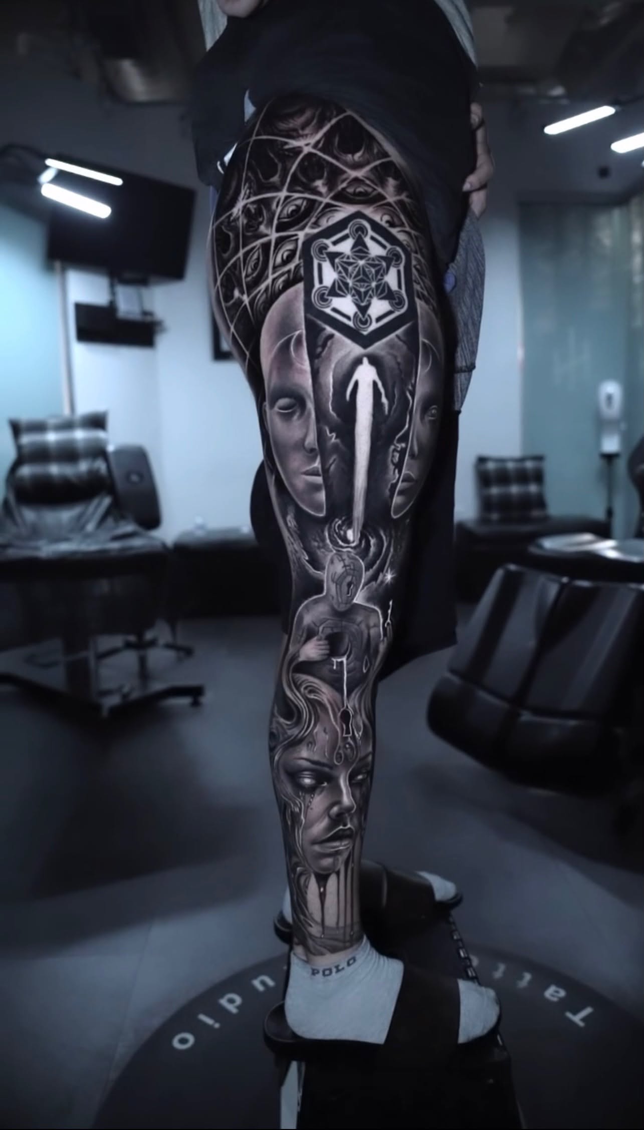 Detailed custom black and grey tattoo